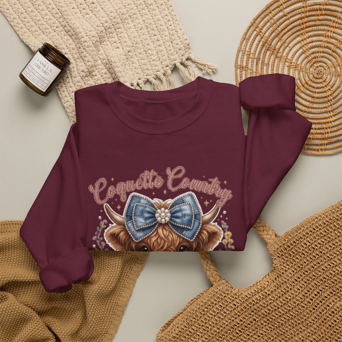 Sweatshirt mit Hochlandrind und blauer Schleife