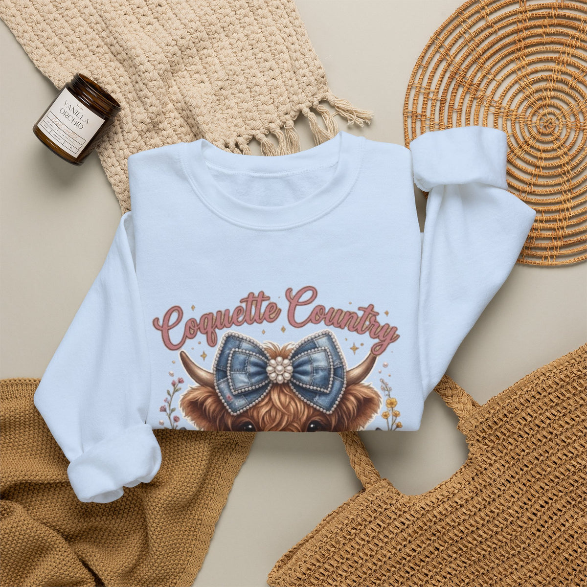 Sweatshirt mit Hochlandrind und blauer Schleife